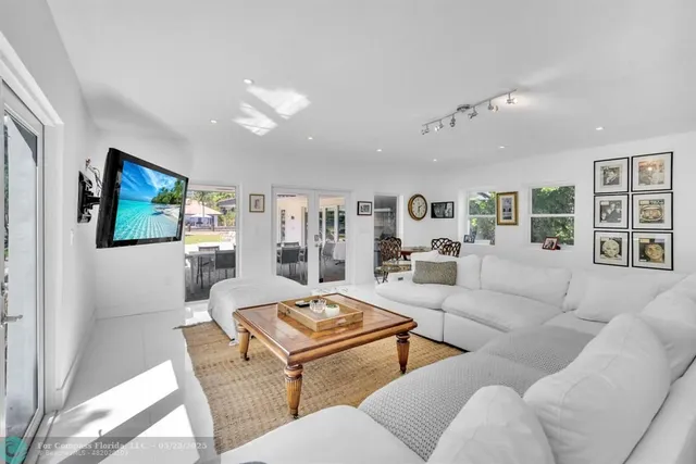an aerial view of residential building and ocean