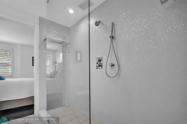 a view of a house with swimming pool and sitting area