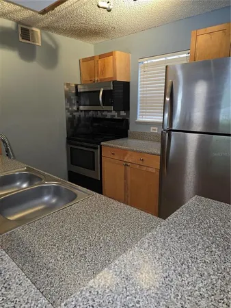 $1,800 | 2500 Winding Creek Boulevard, Unit E205, Clearwater, FL 33761