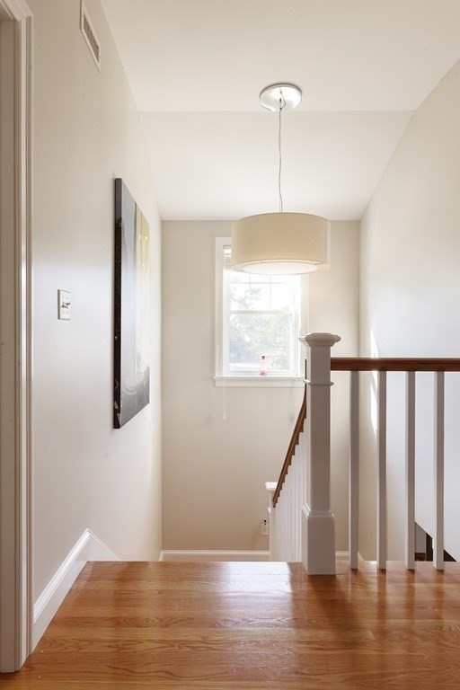 79 Bay State Road Arlington, MA 02474 - Photo 14 of 31 a view of entryway with wooden floor