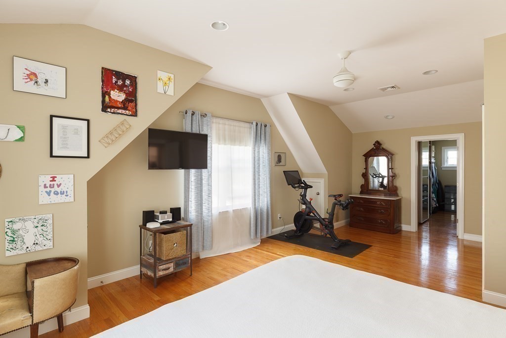 79 Bay State Road Arlington, MA 02474 - Photo 15 of 31 a living room with furniture and a flat screen tv