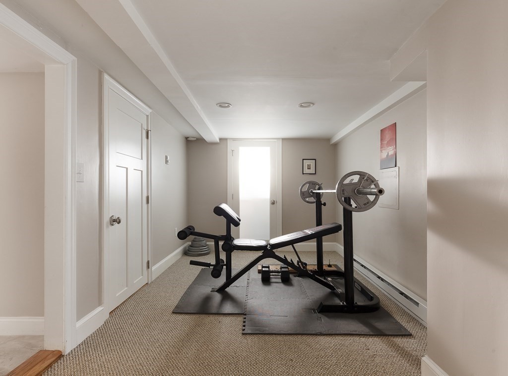 79 Bay State Road Arlington, MA 02474 - Photo 24 of 31 a view of a room with gym equipment