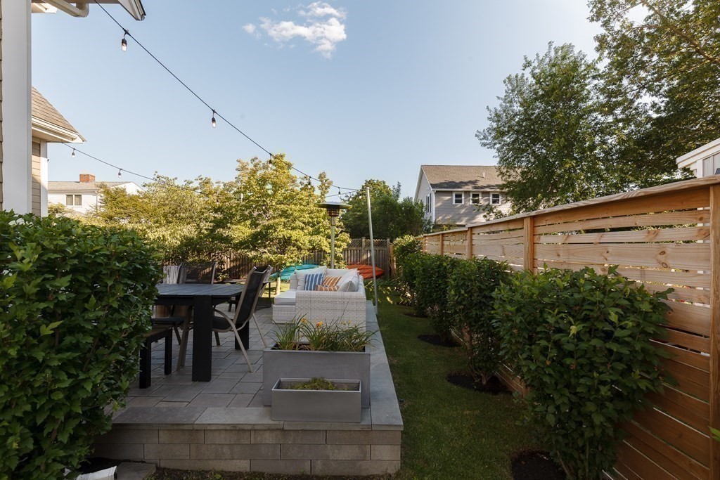 79 Bay State Road Arlington, MA 02474 - Photo 29 of 31 a view of a yard and an outdoor seating