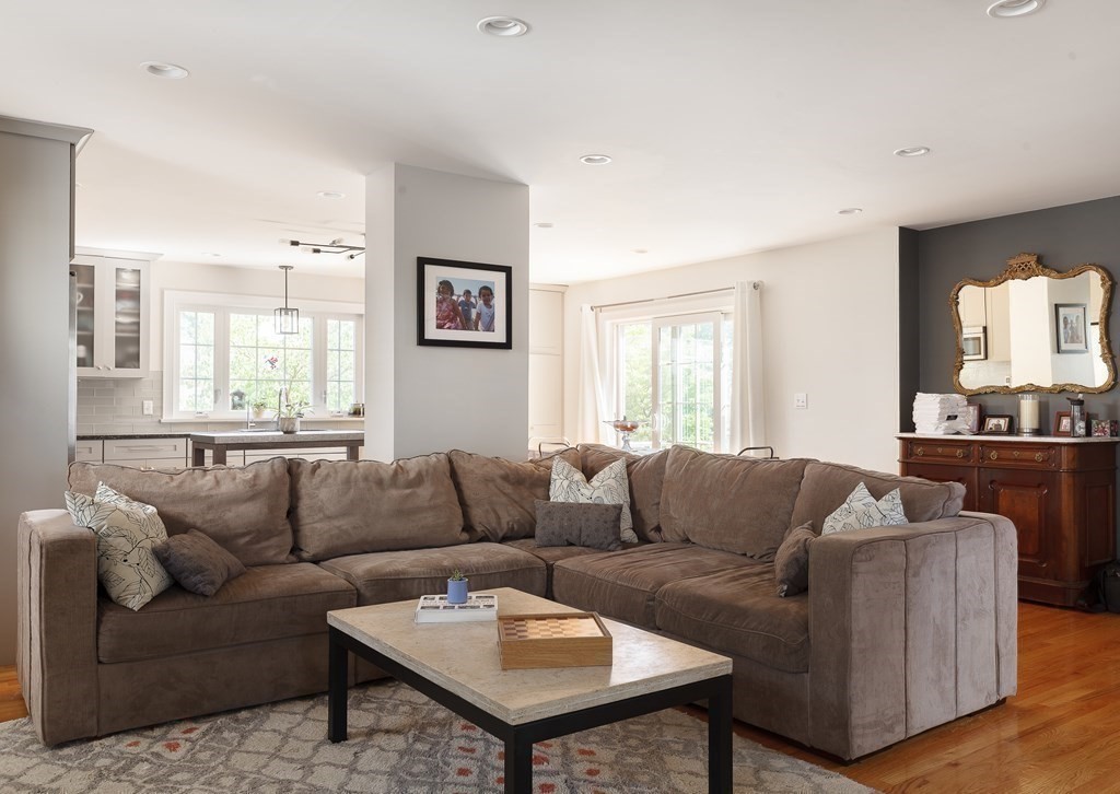 79 Bay State Road Arlington, MA 02474 - Photo 9 of 31 a living room with furniture and a large window