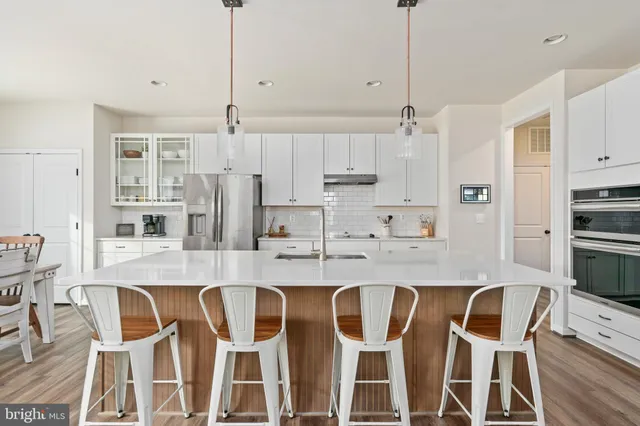 a bedroom with a bed and a night stand