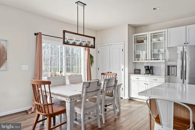 a bedroom with a bed and cabinets