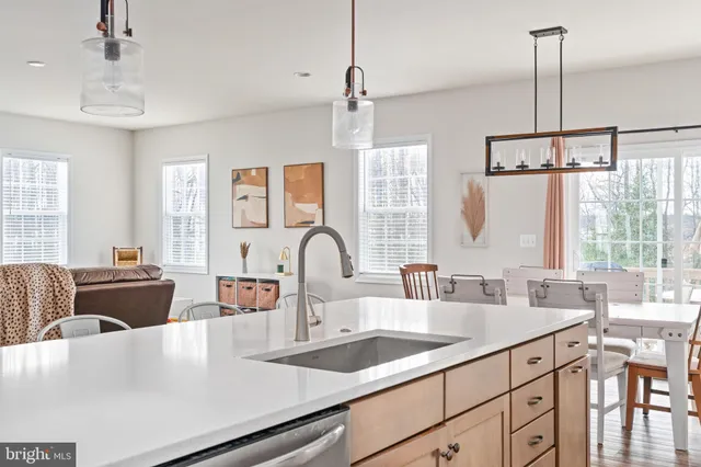 a bedroom with a bed and a table