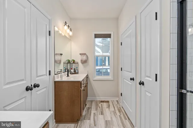 a front view of a house with a street