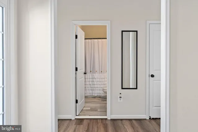 an aerial view of a house with a lake view