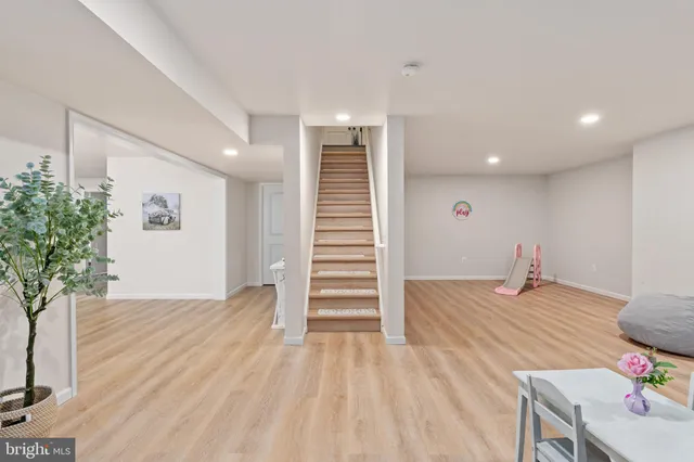 an aerial view of a house with a lake view