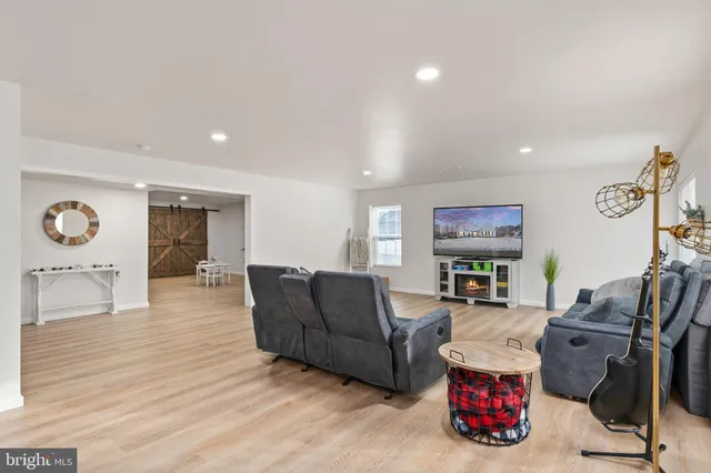 a aerial view of a house with a yard and garden