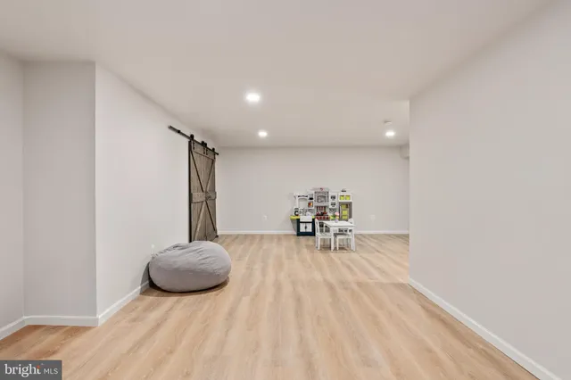 a view of a lake with a house in the background