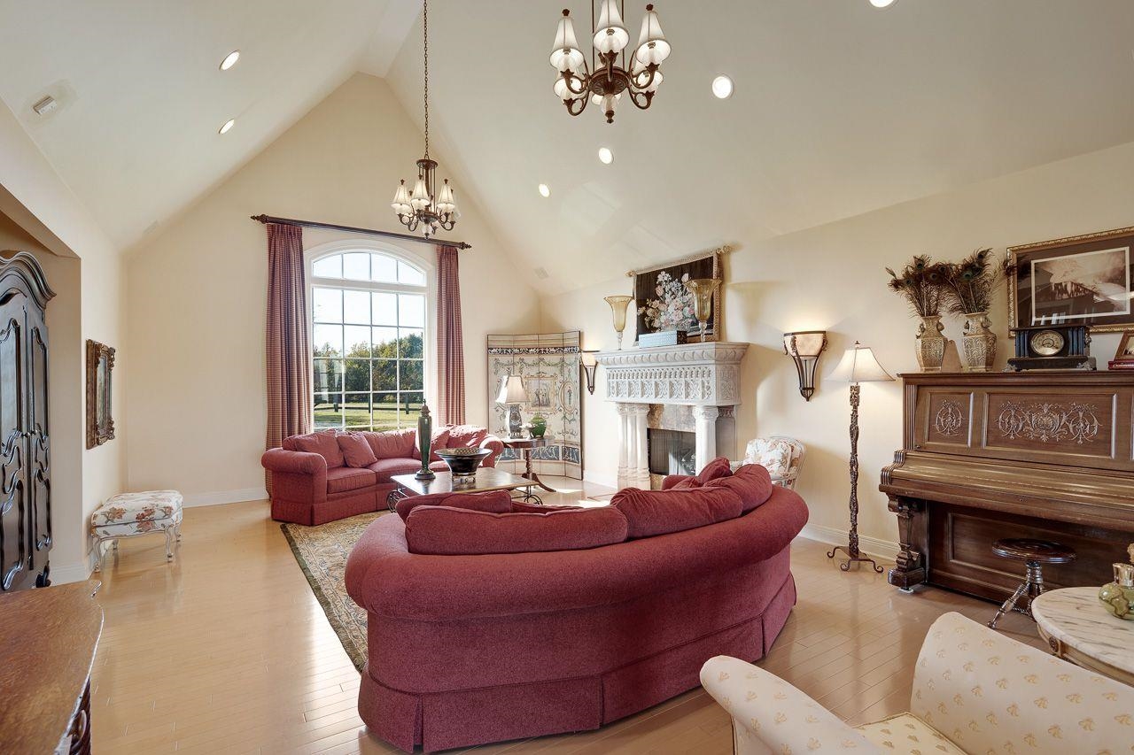 2745 Garrett Ball Road Gates, TN 38037 - Photo 6 of 25 a living room with furniture a fireplace and a flat screen tv