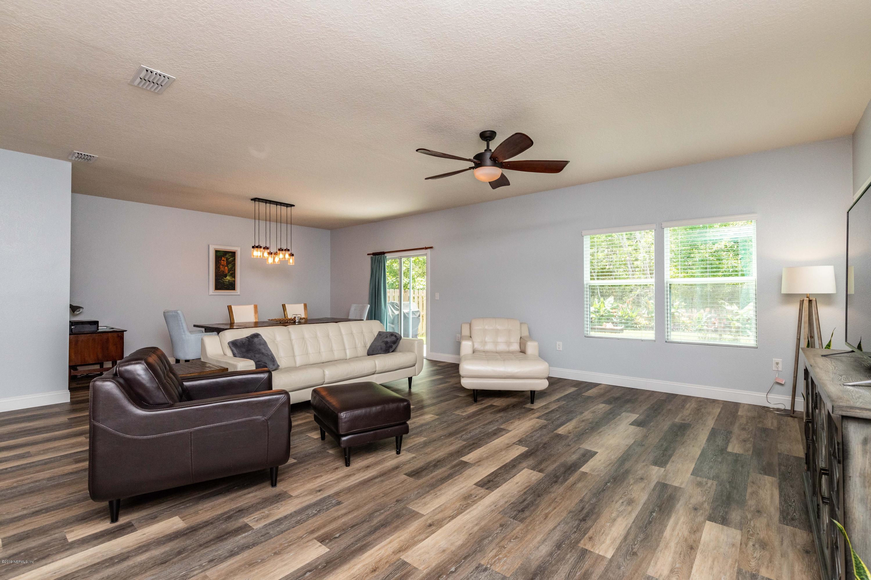 194 Ashby Landing Way St. Augustine, FL 32086 - Photo 17 of 41 a living room with furniture and a window