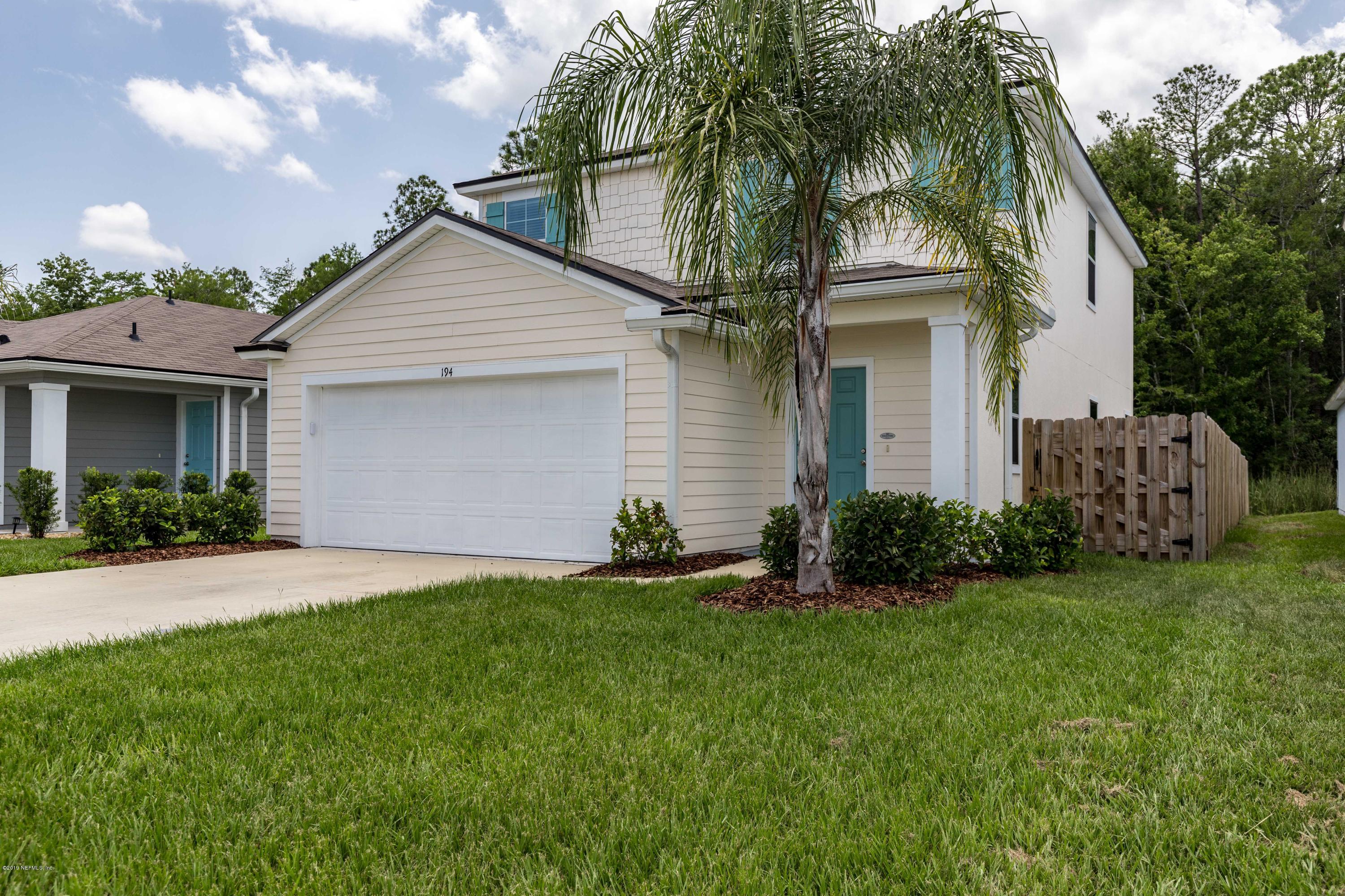 194 Ashby Landing Way St. Augustine, FL 32086 - Photo 3 of 41 a front view of house with yard and green space