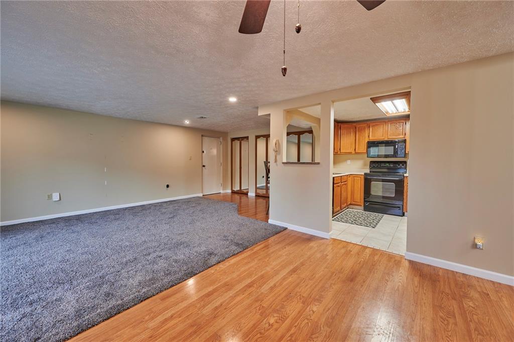 1205 Dutilh Road, Unit 4 Cranberry Township, PA 16066 - Photo 11 of 25 a view of a livingroom with wooden floor