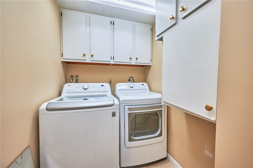 1205 Dutilh Road, Unit 4 Cranberry Township, PA 16066 - Photo 23 of 25 a utility room with dryer and washer