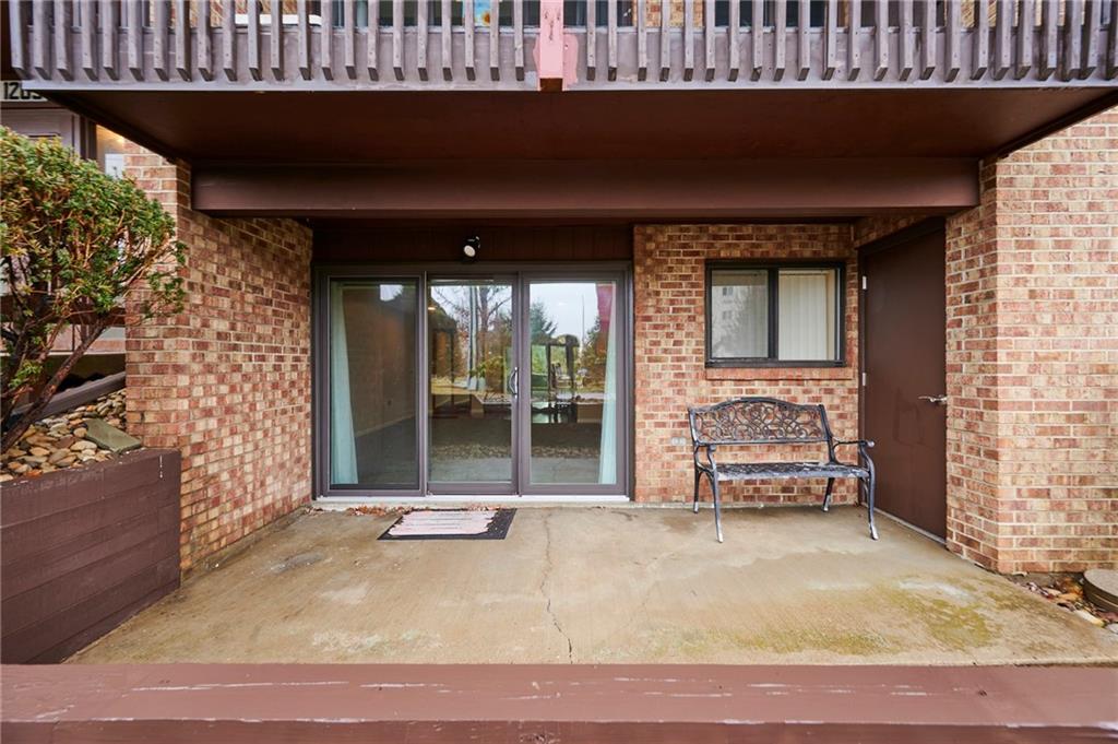 1205 Dutilh Road, Unit 4 Cranberry Township, PA 16066 - Photo 4 of 25 front view of a house with a outdoor space