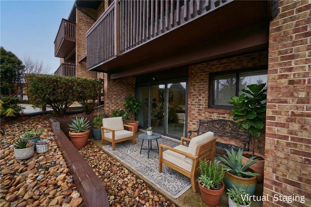 1205 Dutilh Road, Unit 4 Cranberry Township, PA 16066 - Photo 5 of 25 a view of a patio with couches and potted plants