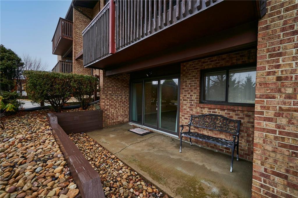 1205 Dutilh Road, Unit 4 Cranberry Township, PA 16066 - Photo 6 of 25 a view of a chairs and table in the balcony