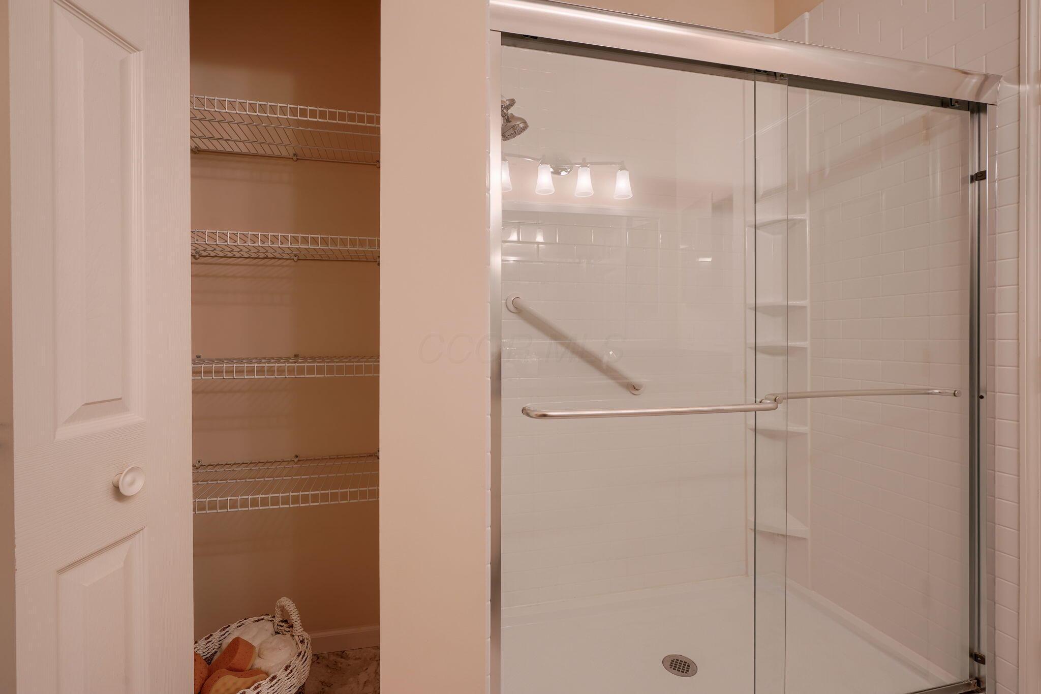 3717 Stoneway Point Powell, OH 43065 - Photo 25 of 44 Linen closet & updated shower
