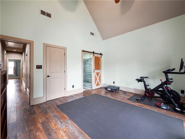 a view of a room with gym equipment
