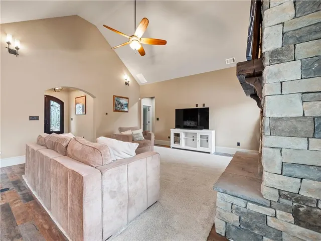 a bed room with a bed and a television