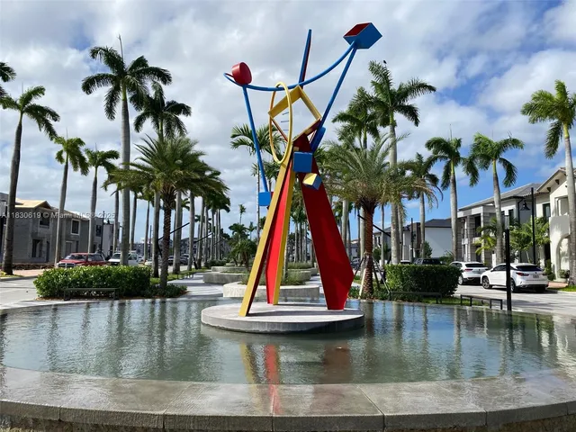 a view of swimming pool with a table and chairs