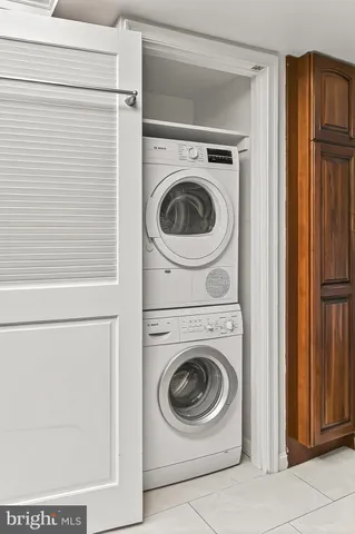 a kitchen with stainless steel appliances granite countertop a stove microwave and refrigerator