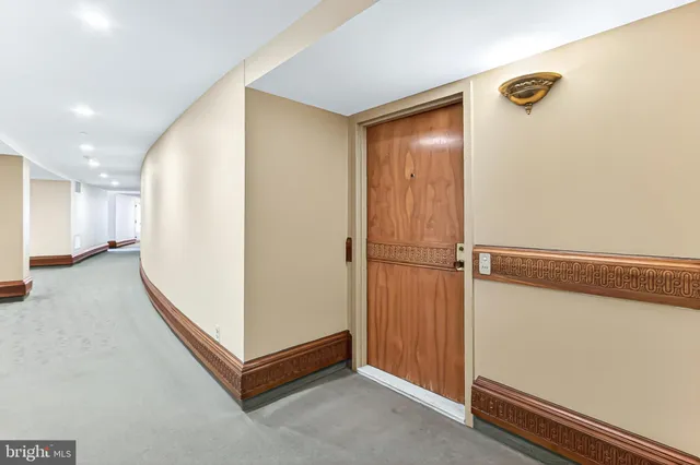 a view of a hallway with closet