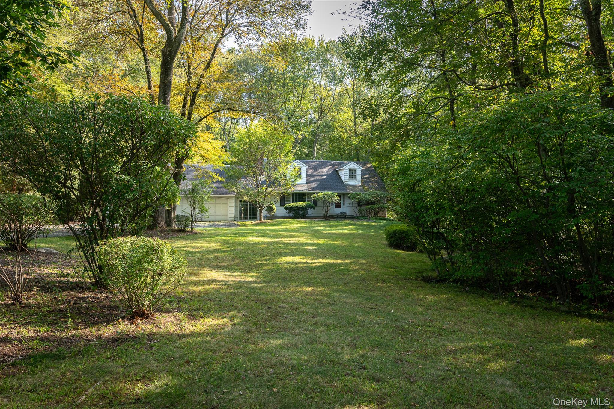 5 Hadley Road Armonk, NY 10504 - Photo 15 of 18 a view of a park with large trees