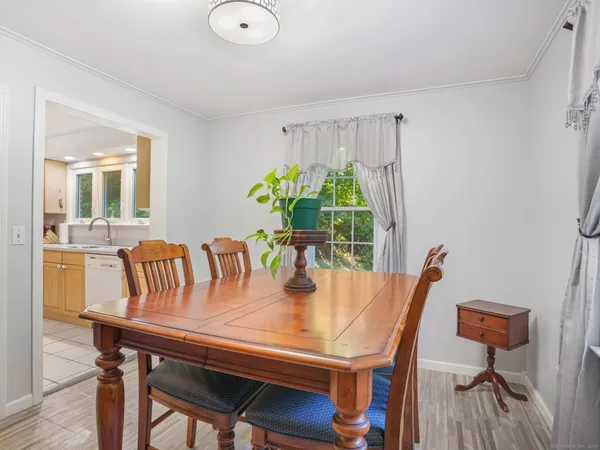 a view of a dining room with furniture