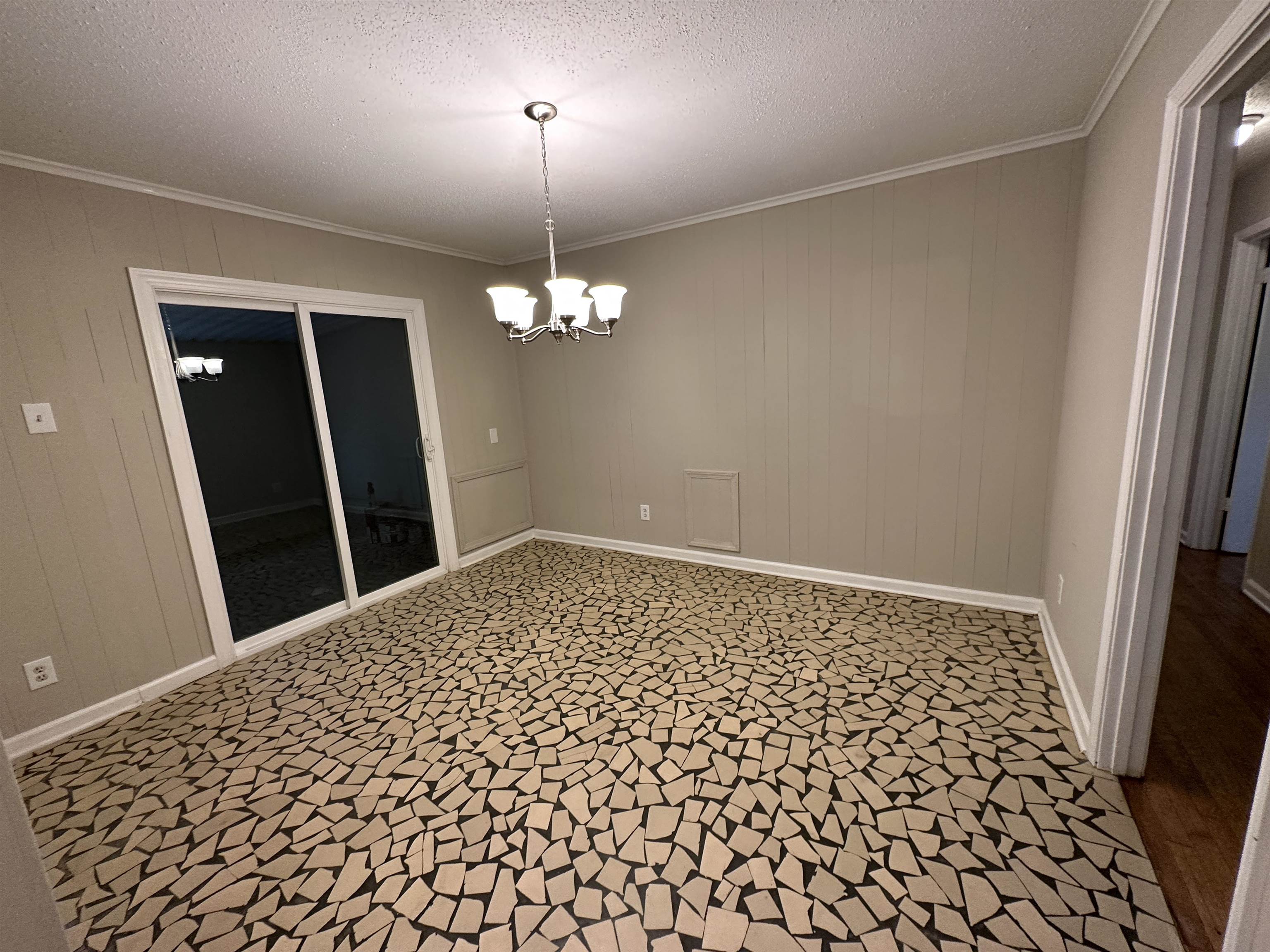 1594 Winfield Road Memphis, TN 38116 - Photo 13 of 29 an empty room with kitchen view