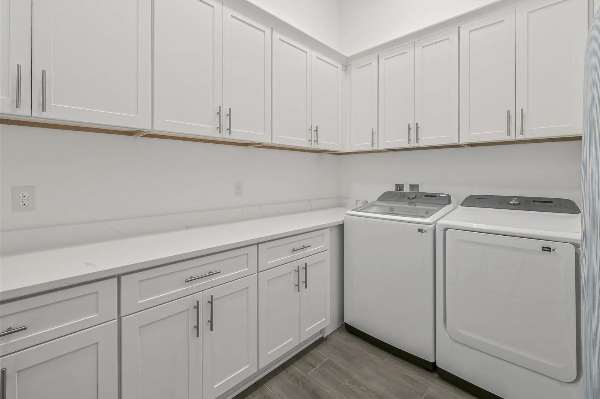 115 Maple Street Santa Rosa Beach, FL 32459 - Photo 29 of 44 a view of cabinets with wooden floor