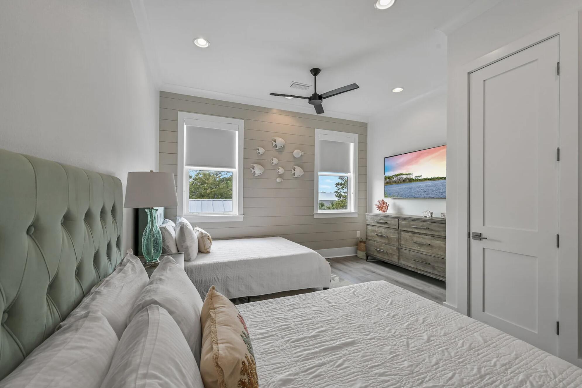 115 Maple Street Santa Rosa Beach, FL 32459 - Photo 36 of 44 a bedroom with a bed and a window