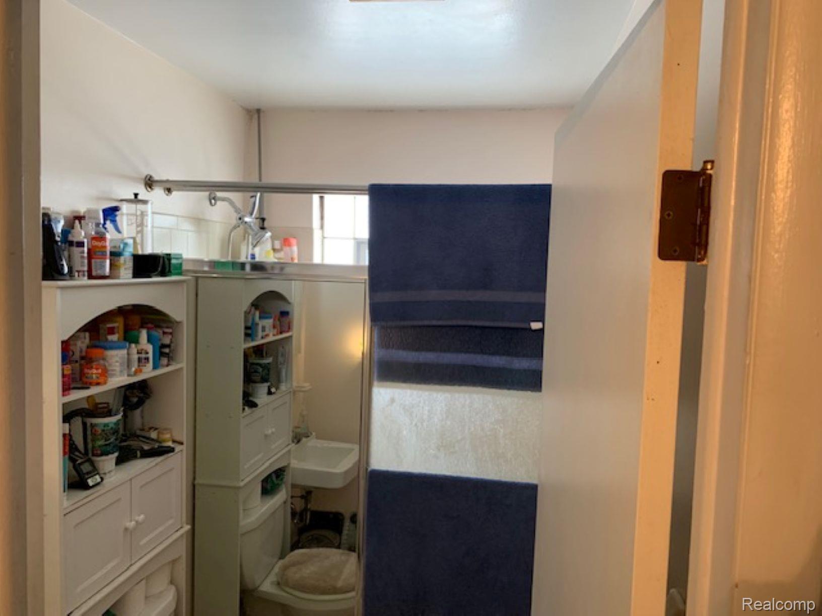 14405 Stephens Road Warren, MI 48089 - Photo 11 of 16 Bathroom with toilet and a sink