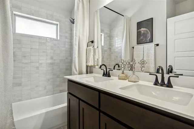 a bedroom with a bed and a mirror