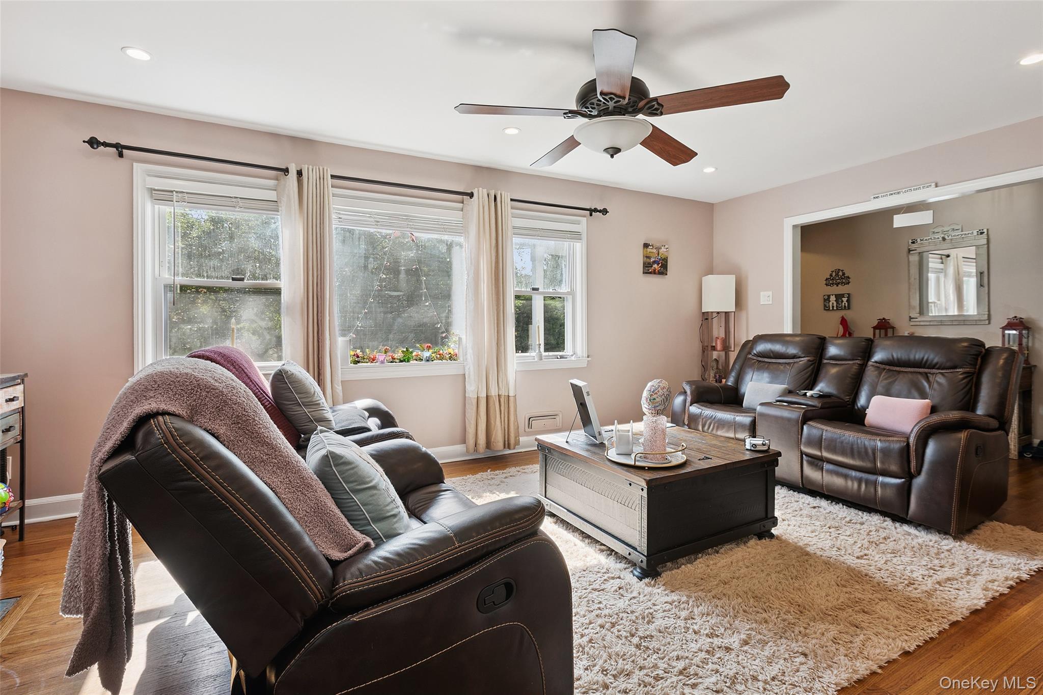 69 Ardell Road Bronxville, NY 10708 - Photo 12 of 48 a living room with furniture ceiling fan and a rug