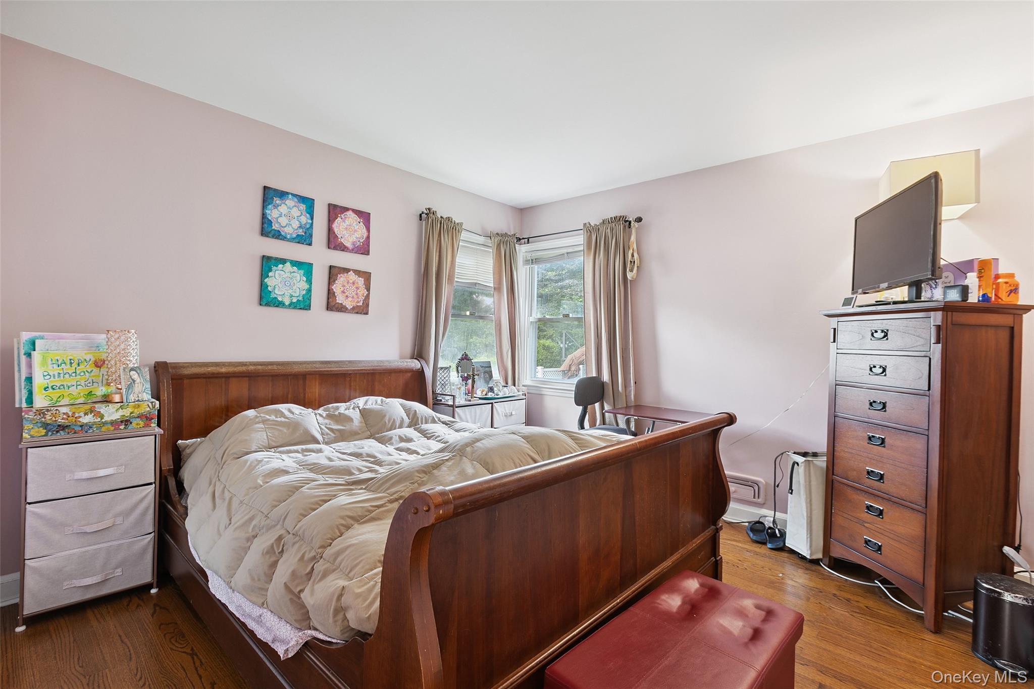 69 Ardell Road Bronxville, NY 10708 - Photo 18 of 48 a bedroom with a bed and a tv