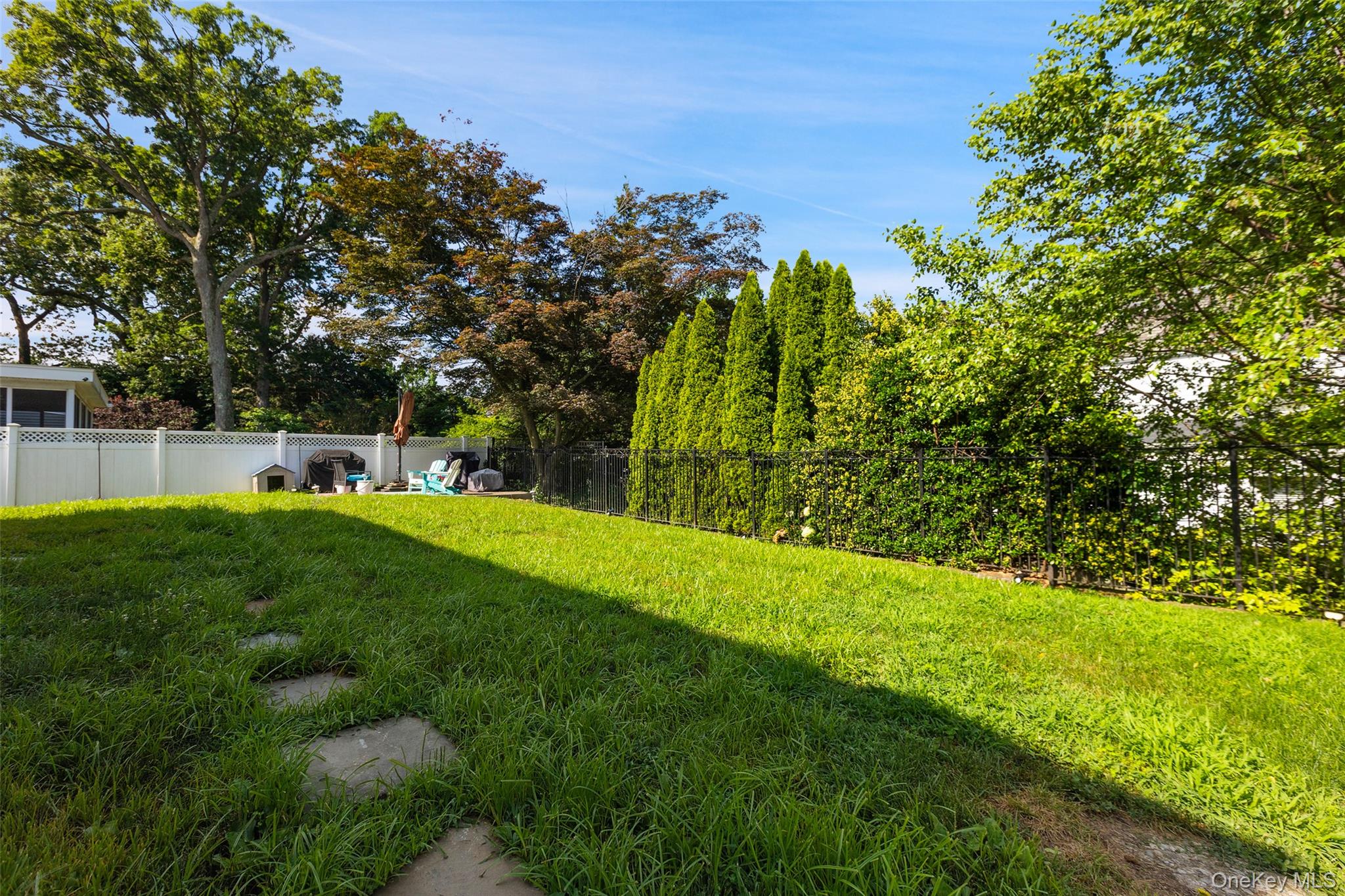 69 Ardell Road Bronxville, NY 10708 - Photo 28 of 48 a view of yard with grass and trees