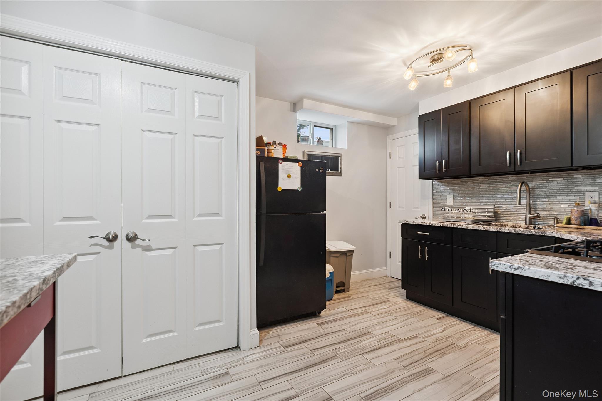 69 Ardell Road Bronxville, NY 10708 - Photo 33 of 48 a kitchen with a refrigerator and a stove