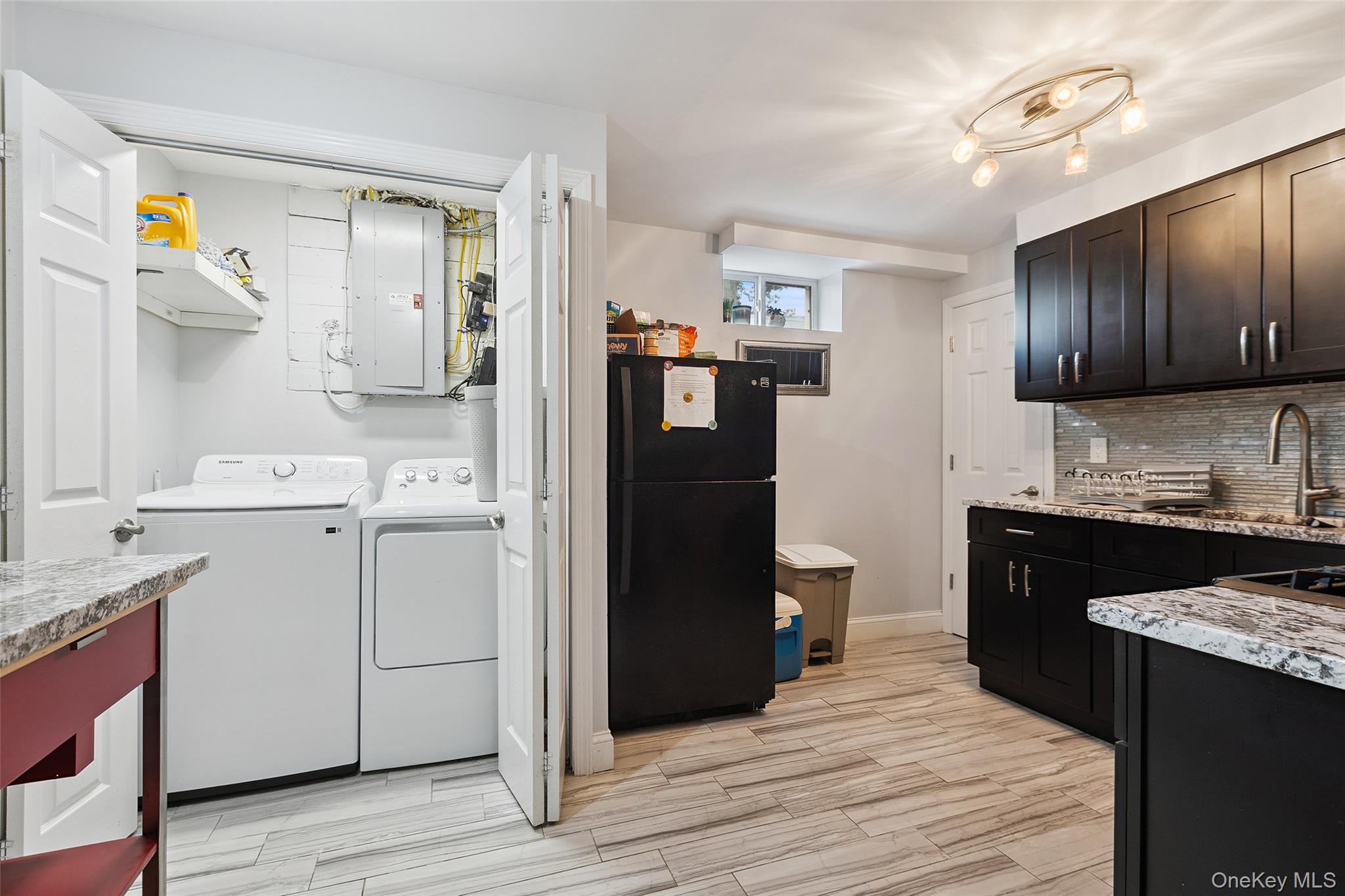69 Ardell Road Bronxville, NY 10708 - Photo 34 of 48 a kitchen with a refrigerator and a sink