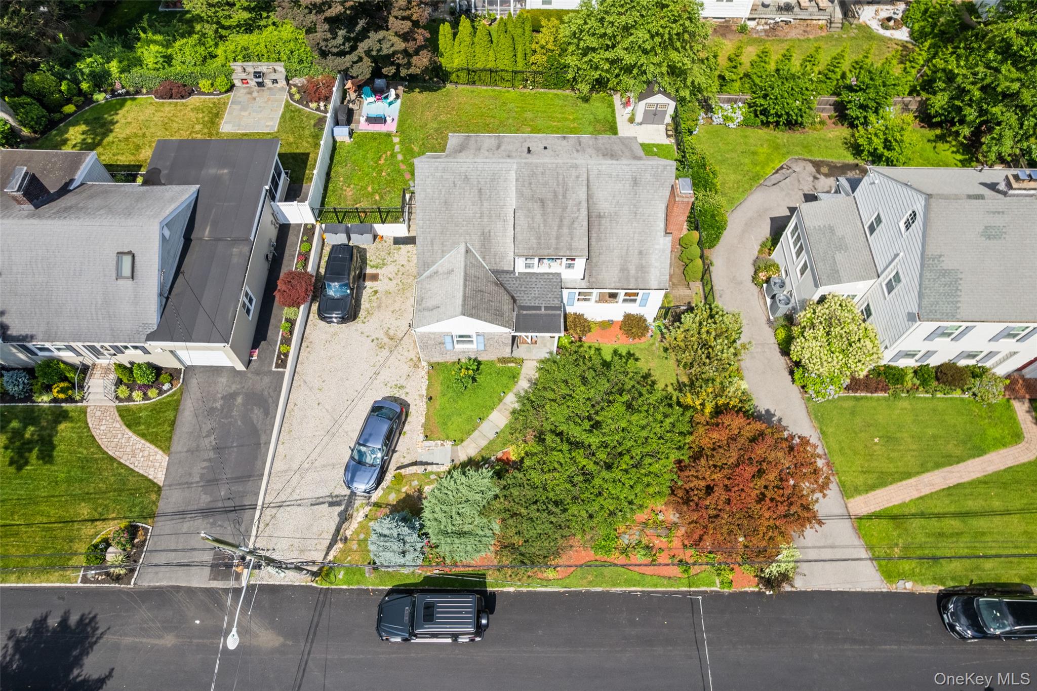 69 Ardell Road Bronxville, NY 10708 - Photo 38 of 48 an aerial view of residential house with outdoor space and swimming pool