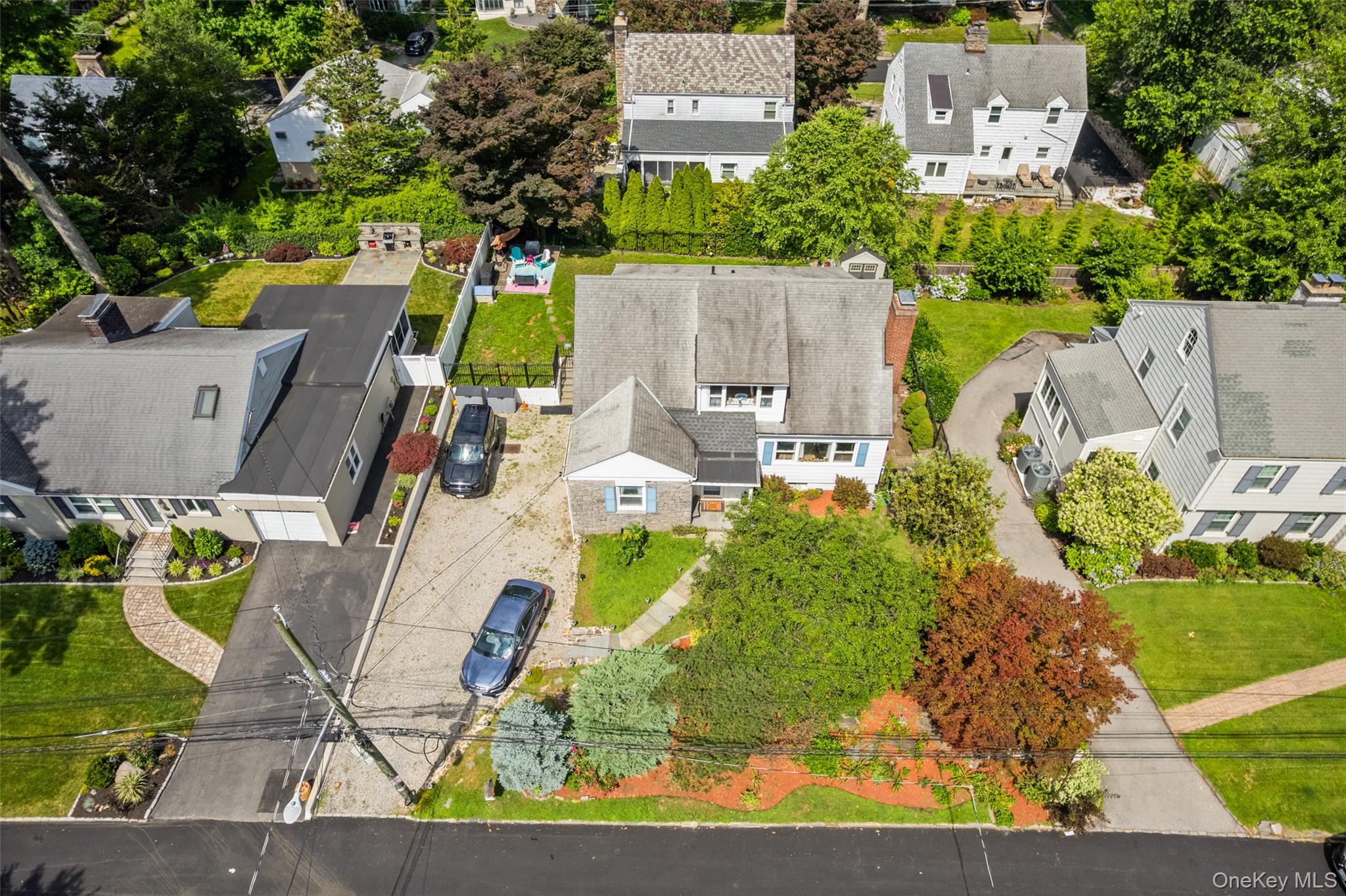 69 Ardell Road Bronxville, NY 10708 - Photo 46 of 48 an aerial view of a house with a yard basket ball court and outdoor seating