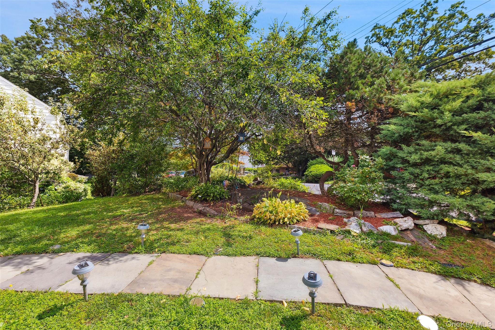 69 Ardell Road Bronxville, NY 10708 - Photo 6 of 48 a view of a backyard
