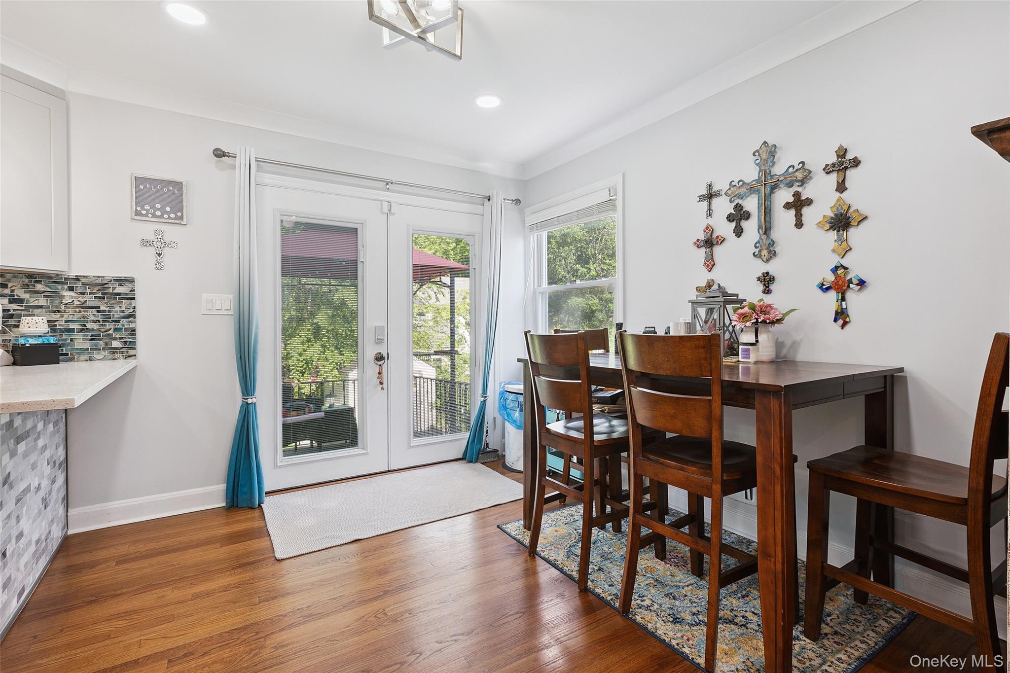 69 Ardell Road Bronxville, NY 10708 - Photo 10 of 48 a view of a dining room with furniture and wooden floor