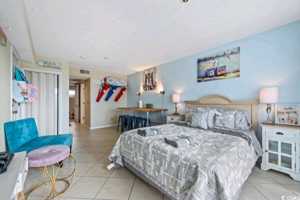 2000 South Ocean Boulevard, Unit V207AB Myrtle Beach, SC 29577 - Photo 10 of 11 Bedroom featuring light tile patterned flooring and baseboards