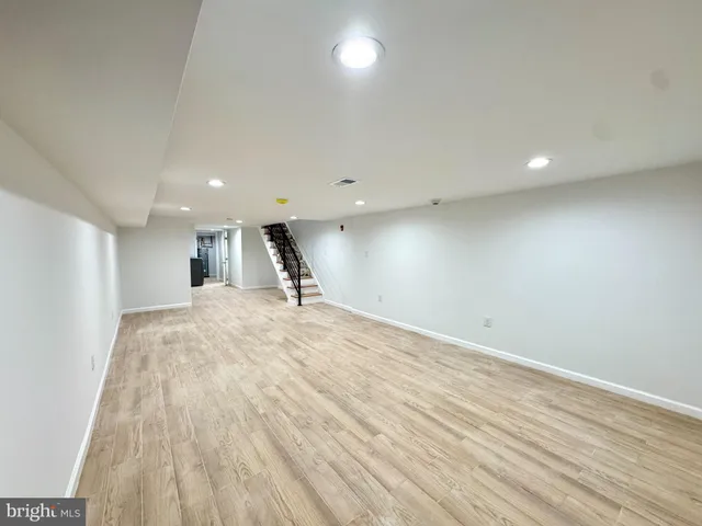 a view of a livingroom with a staircase