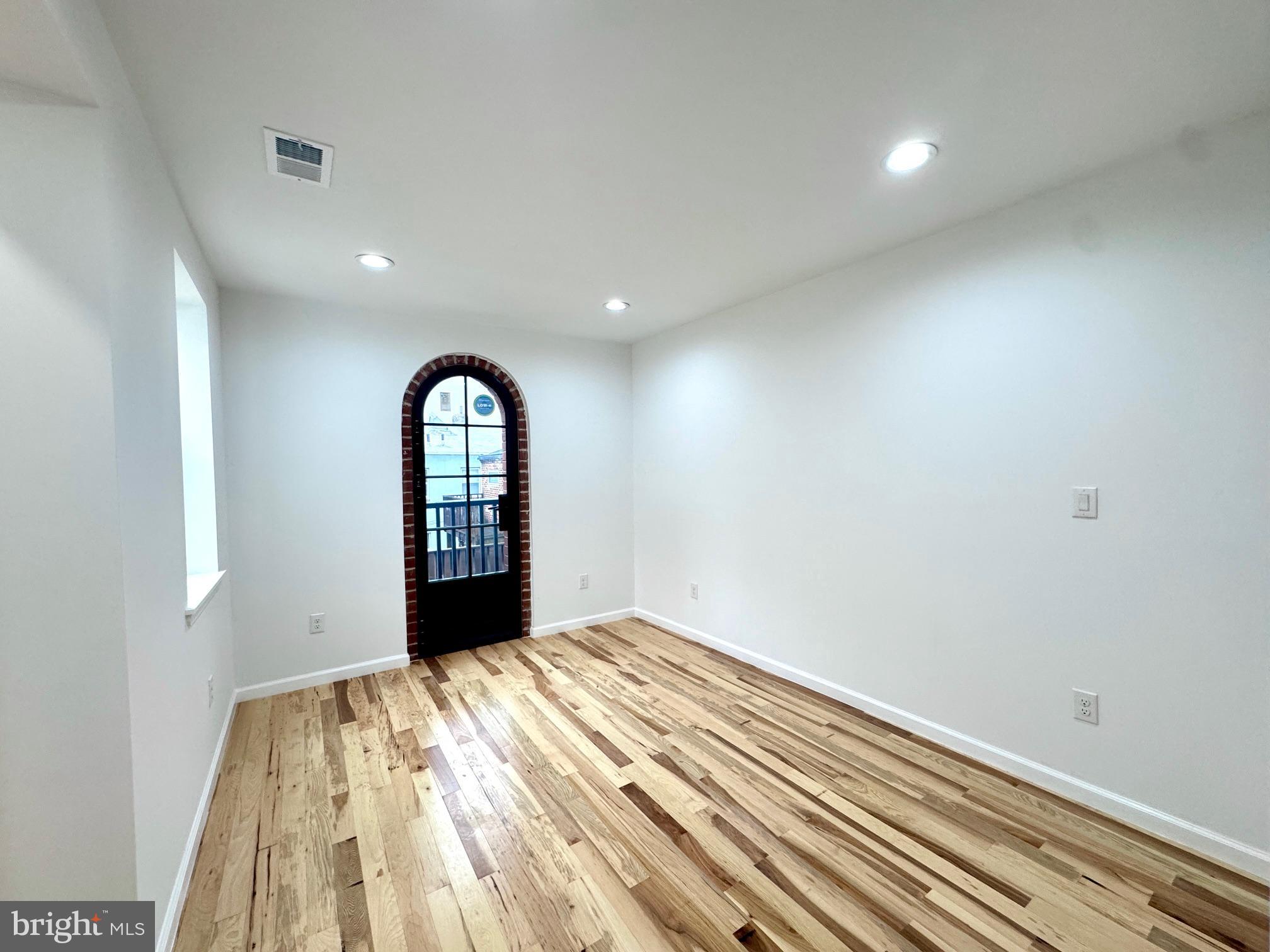781 South 3rd Street, Unit 3 Philadelphia, PA 19147 - Photo 13 of 17 a view of a big room with wooden floor and window