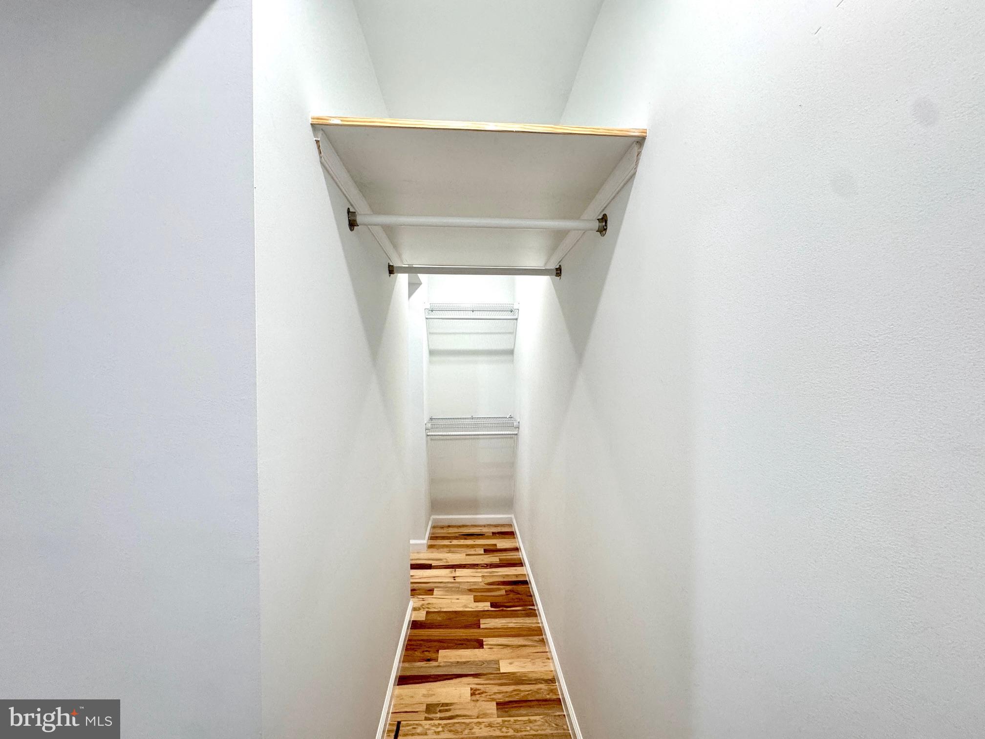 781 South 3rd Street, Unit 3 Philadelphia, PA 19147 - Photo 16 of 17 a view of a hallway with white walls and a window